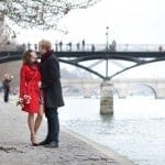 Romantic couple in love dating near Pont des Arts in Paris