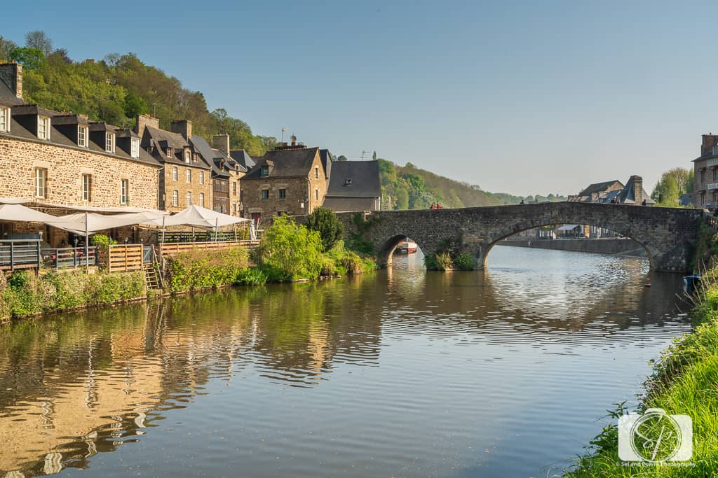 https://misadventureswithandi.com/wp-content/uploads/2019/05/Bridge-over-the-River-Rance-in-Dinan-France-Brittany.jpg